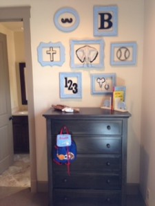 view of collage wall in nursery